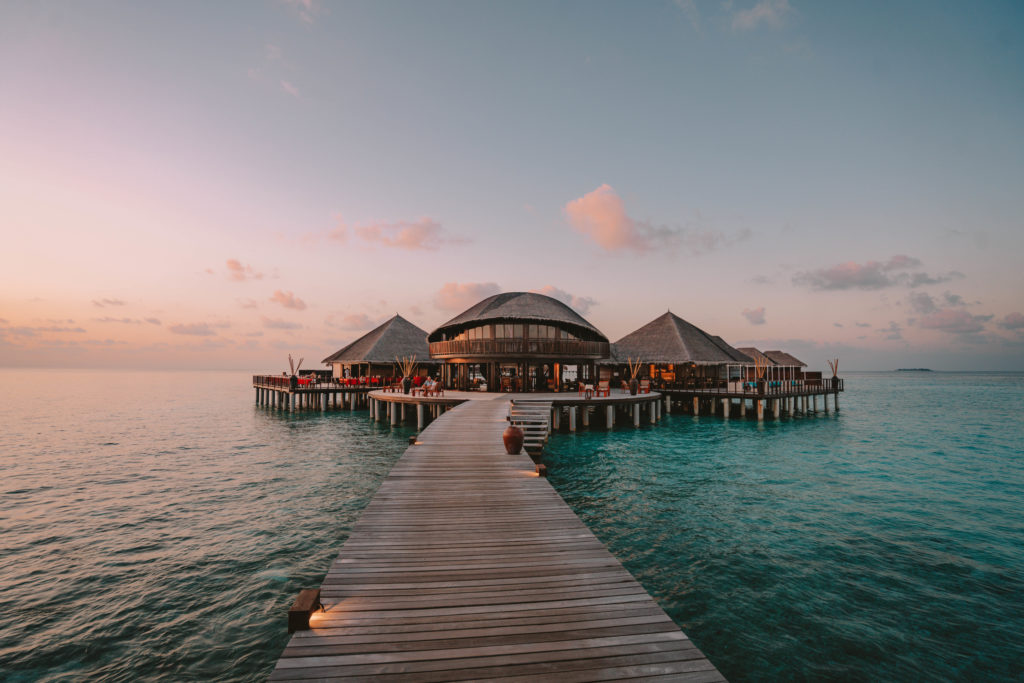 Sunset at the overwater restaurant Coco Bodu Hithi 