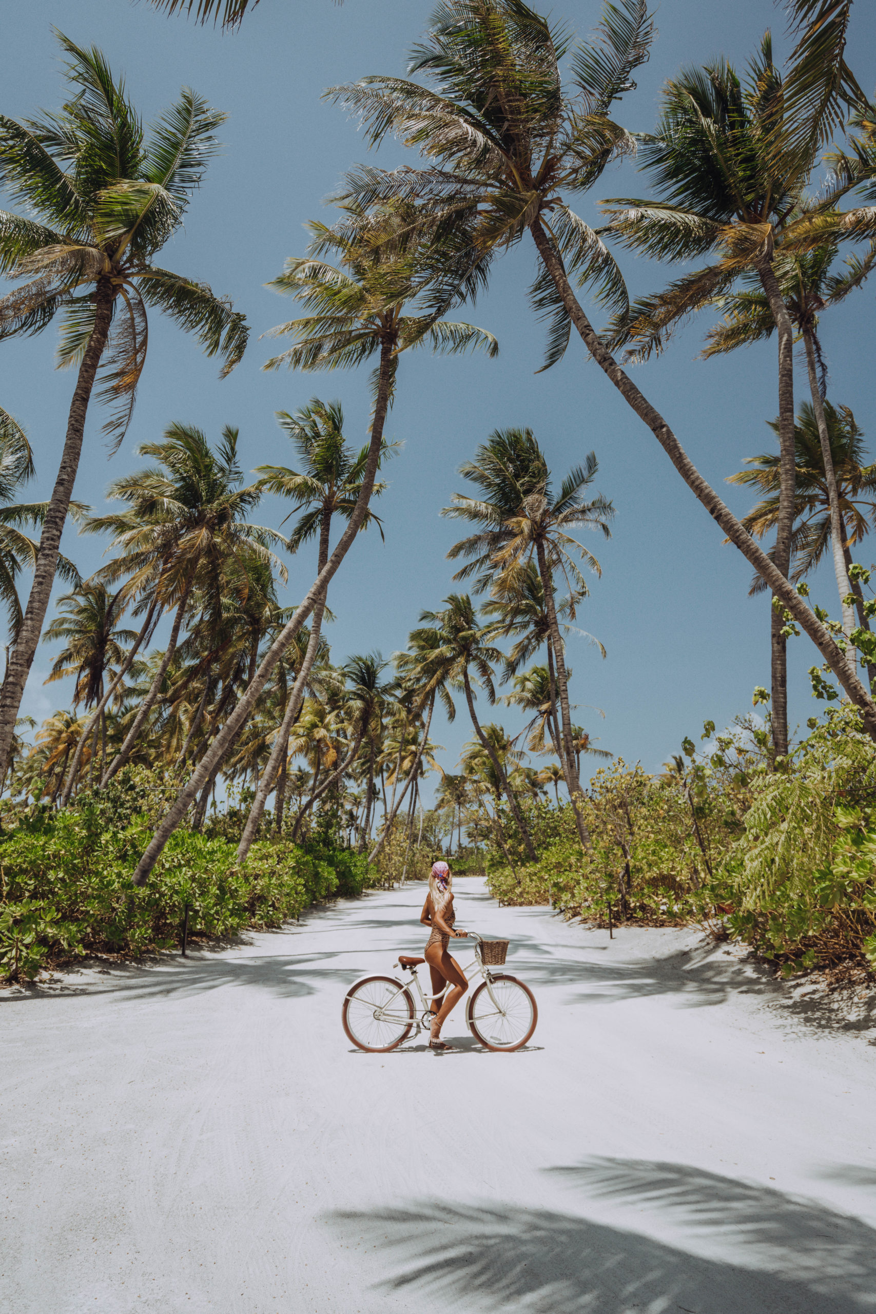 Salty Luxe on a bicycle at Patina Maldives
