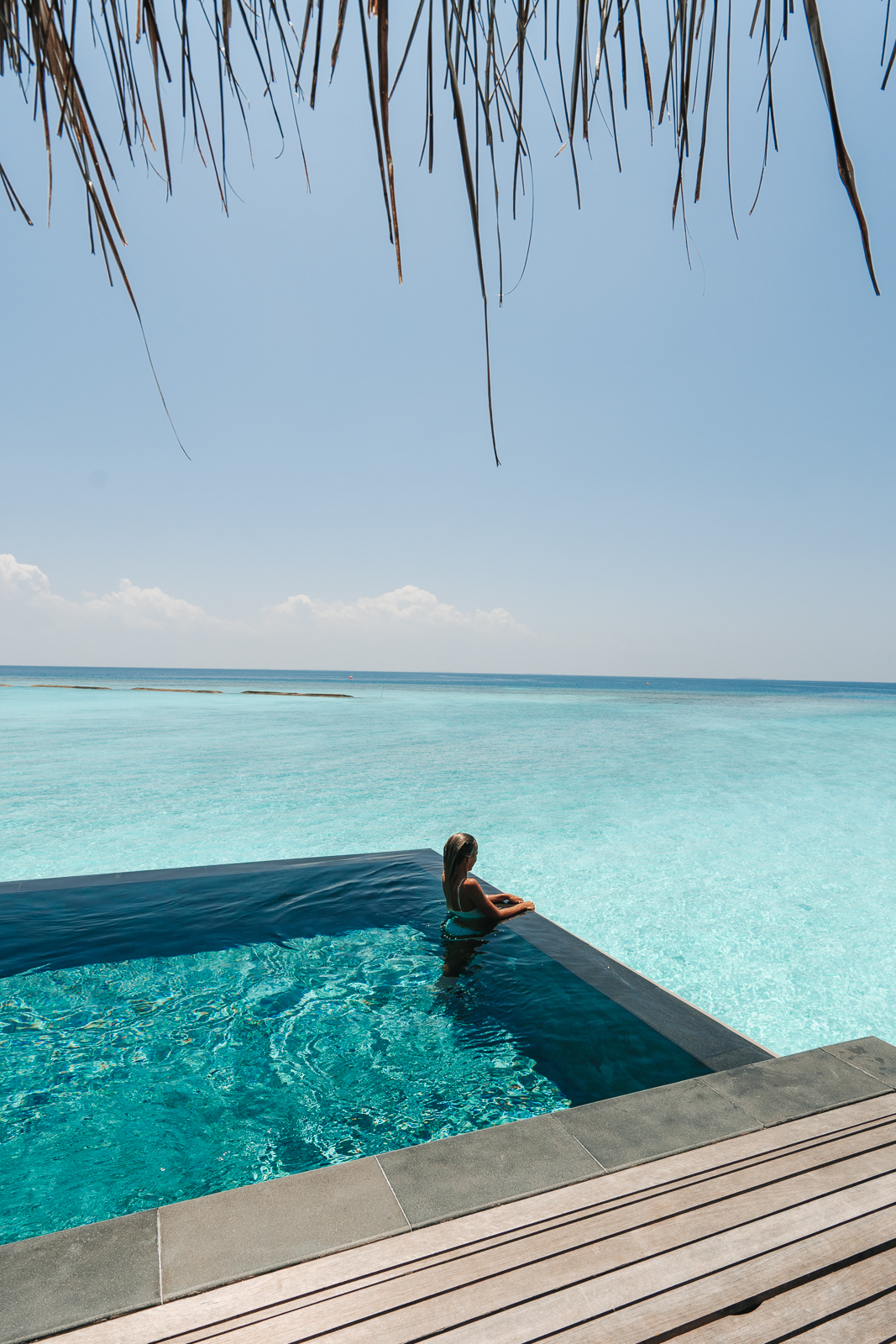 pool by beach at vakkaru maldives