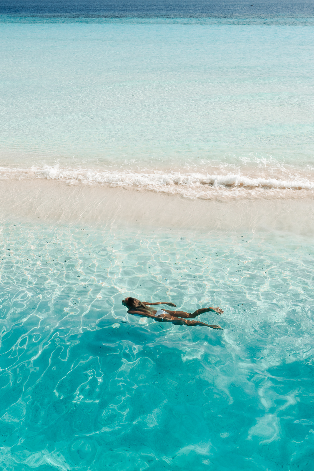salty luxe in the clear water at one of the top Maldives resorts, joali maldives