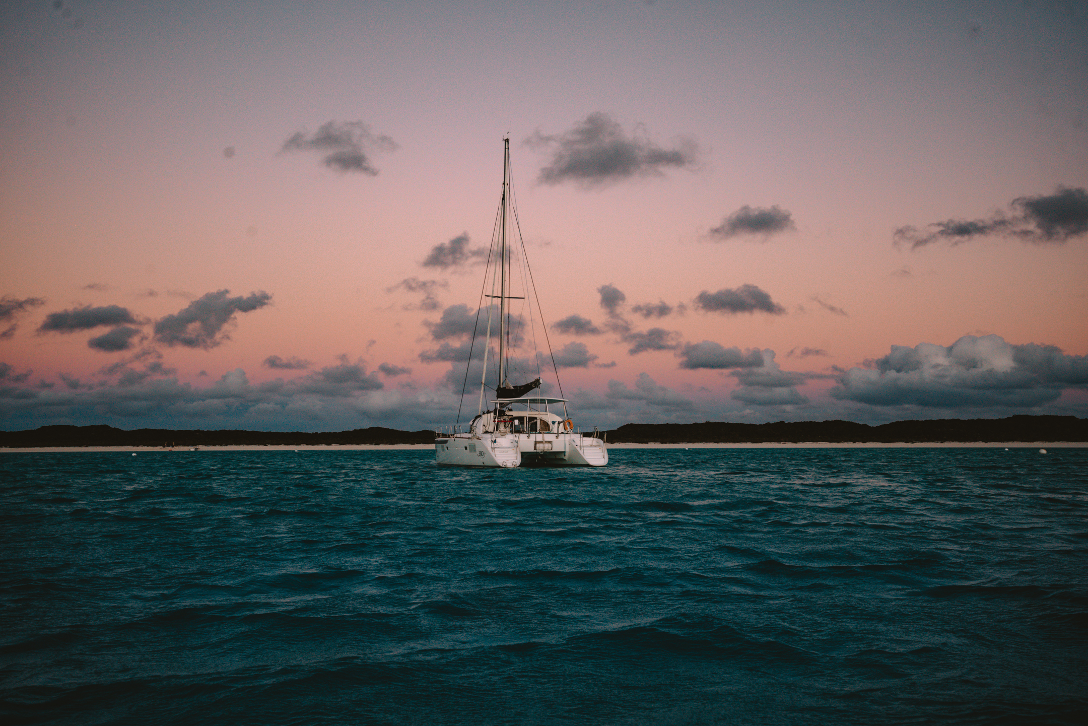 sailing the exumas at sunset