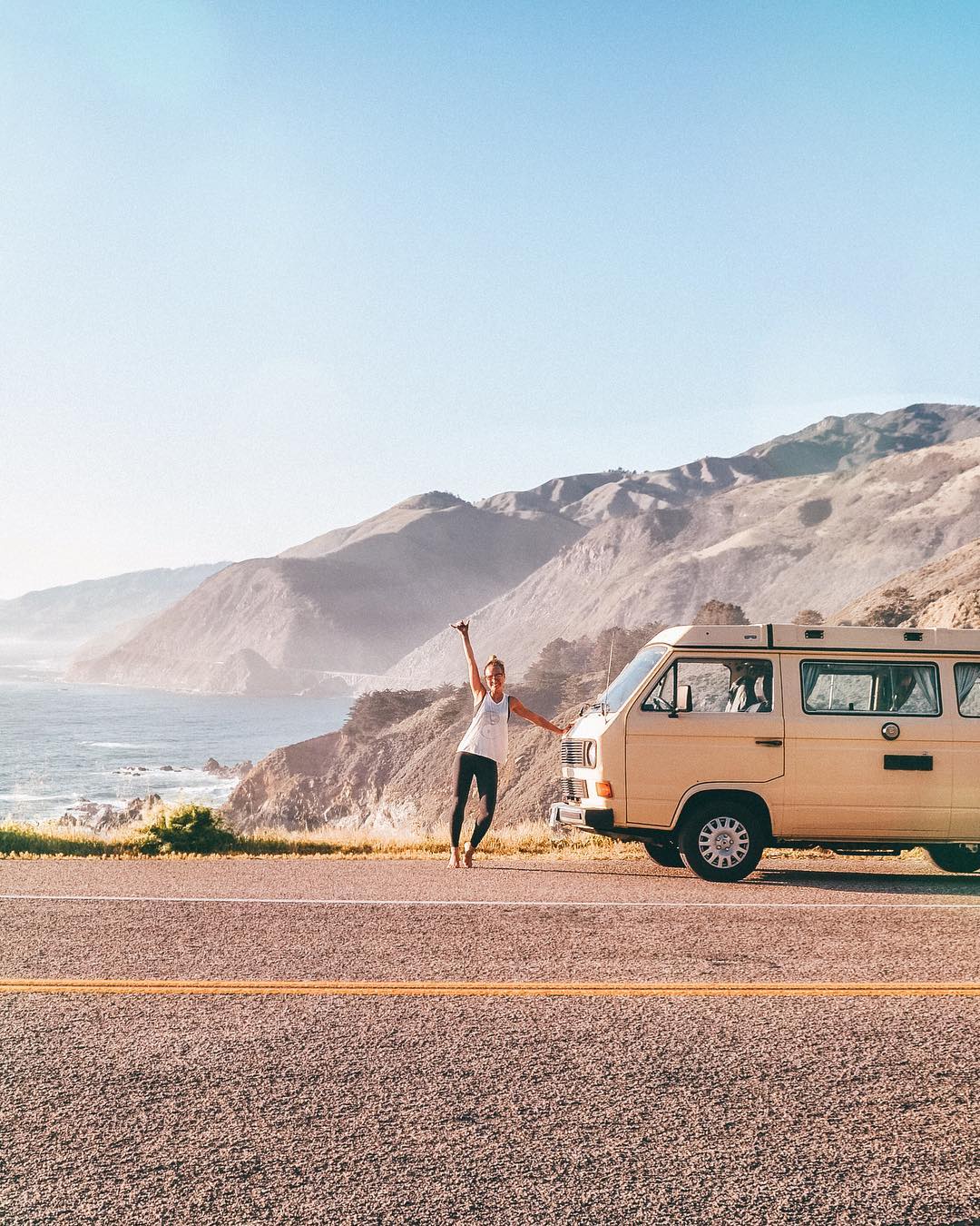 Sarah backpacking in California with a VW Kombi van.