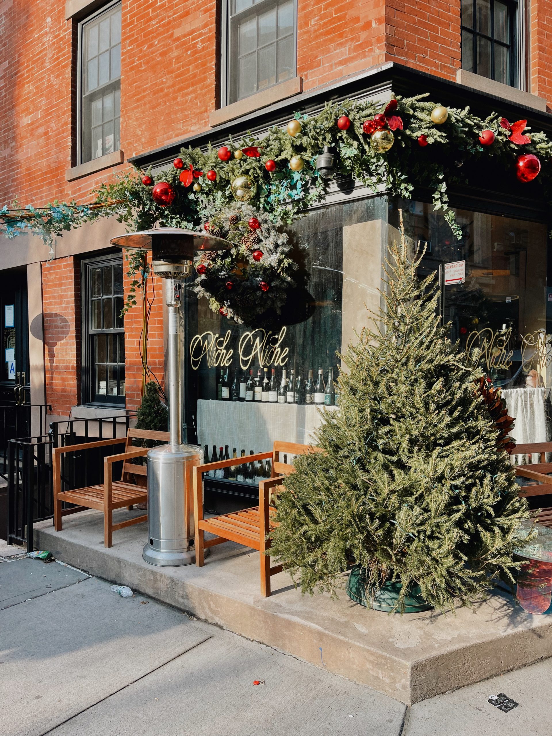 Christmas decorations at store front in West Village