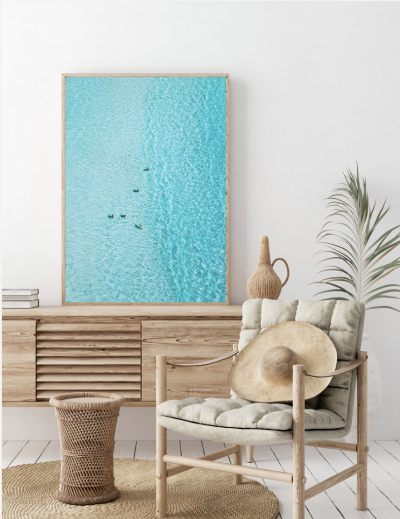 Aerial ocean image of people swimming in the water - Salty Luxe print hanging in home