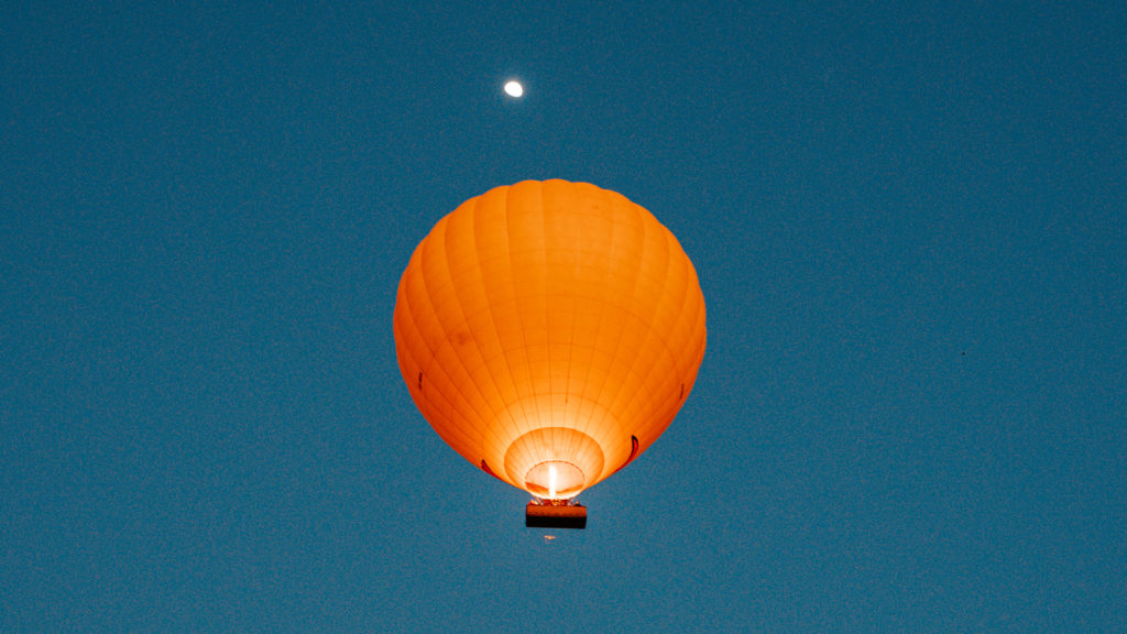 Hot air balloon with the moon beyond