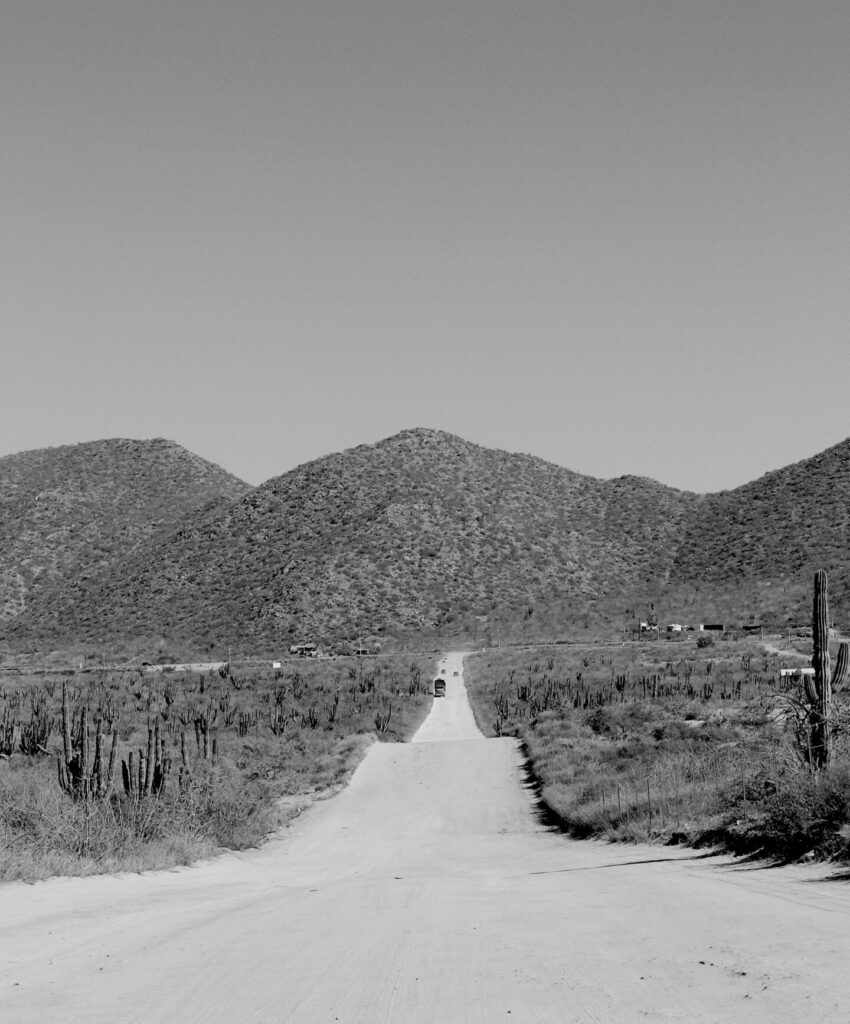 Black and white image of the road leading into Cerritos Beach.