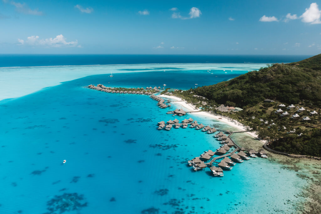 Aerial view of overwater villas at Conrad Bora Bora Resort
