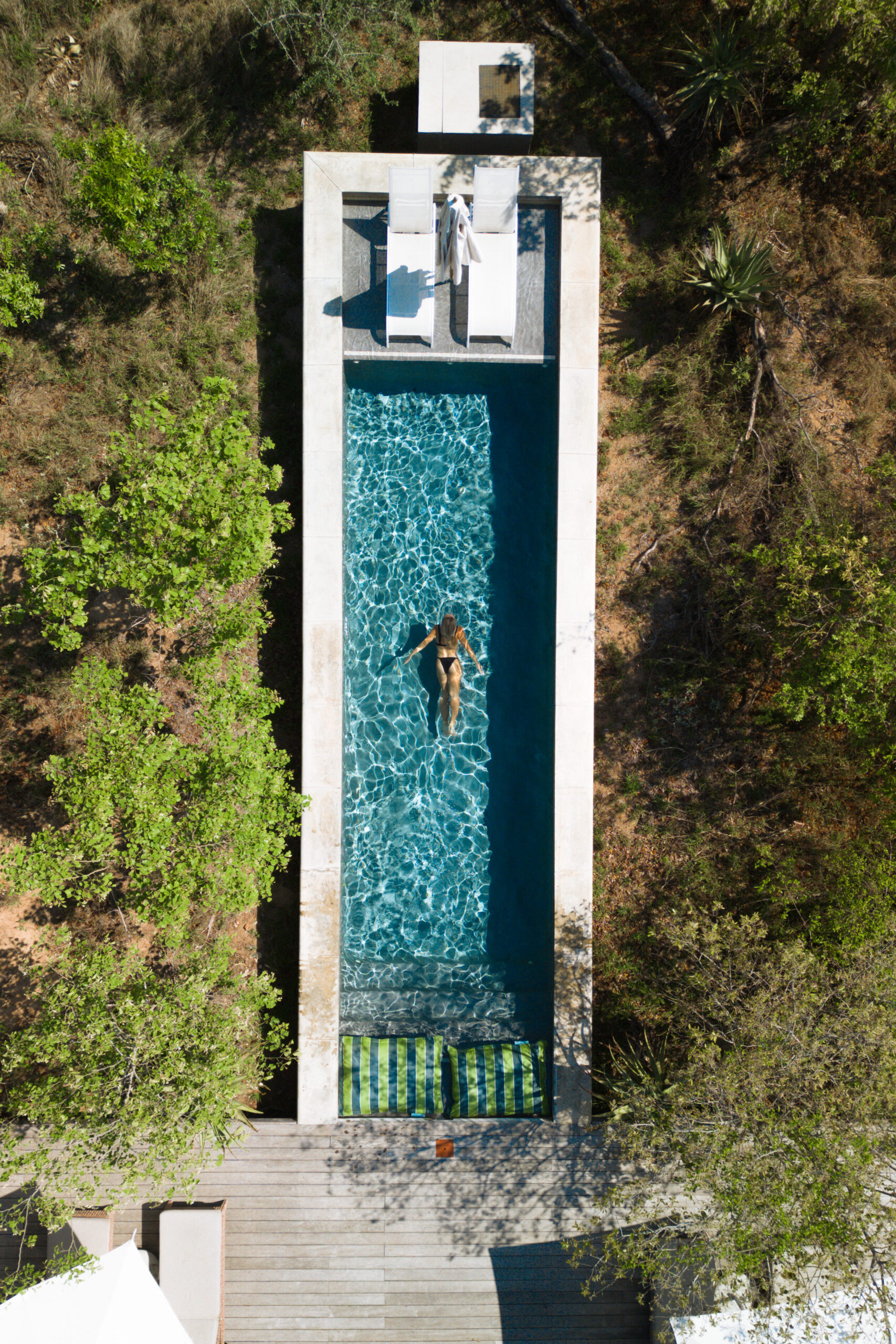 drone photo of salty luxe in farmstead farmhouse pool