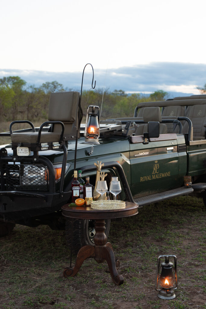 royal malewane safari vehicle with sunset drink setup