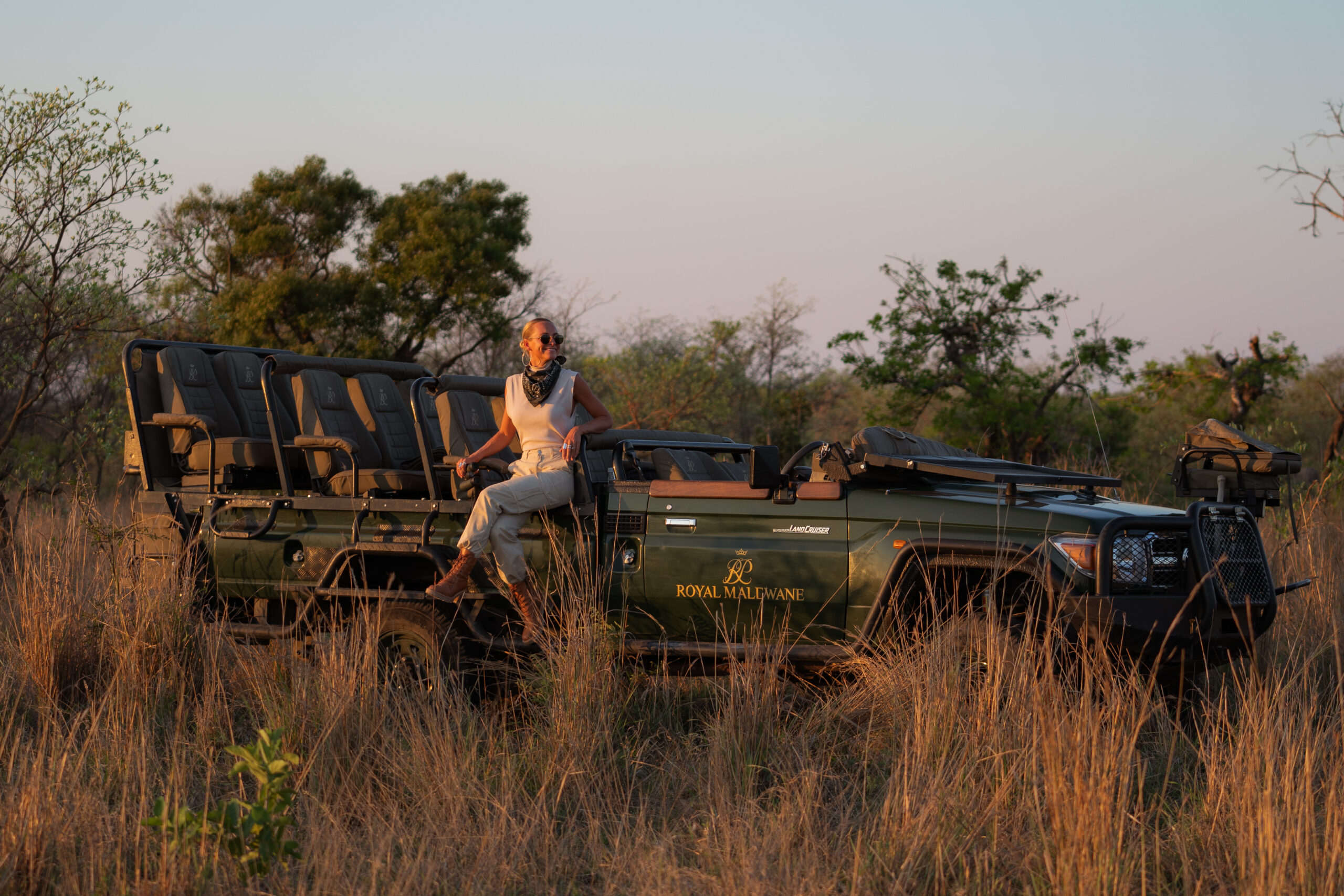 salty luxe sitting in a royal malewane land rover safari vehicle