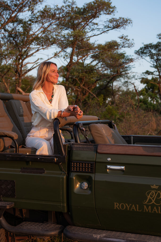 salty luxe sitting in a royal malewane safari vehicle