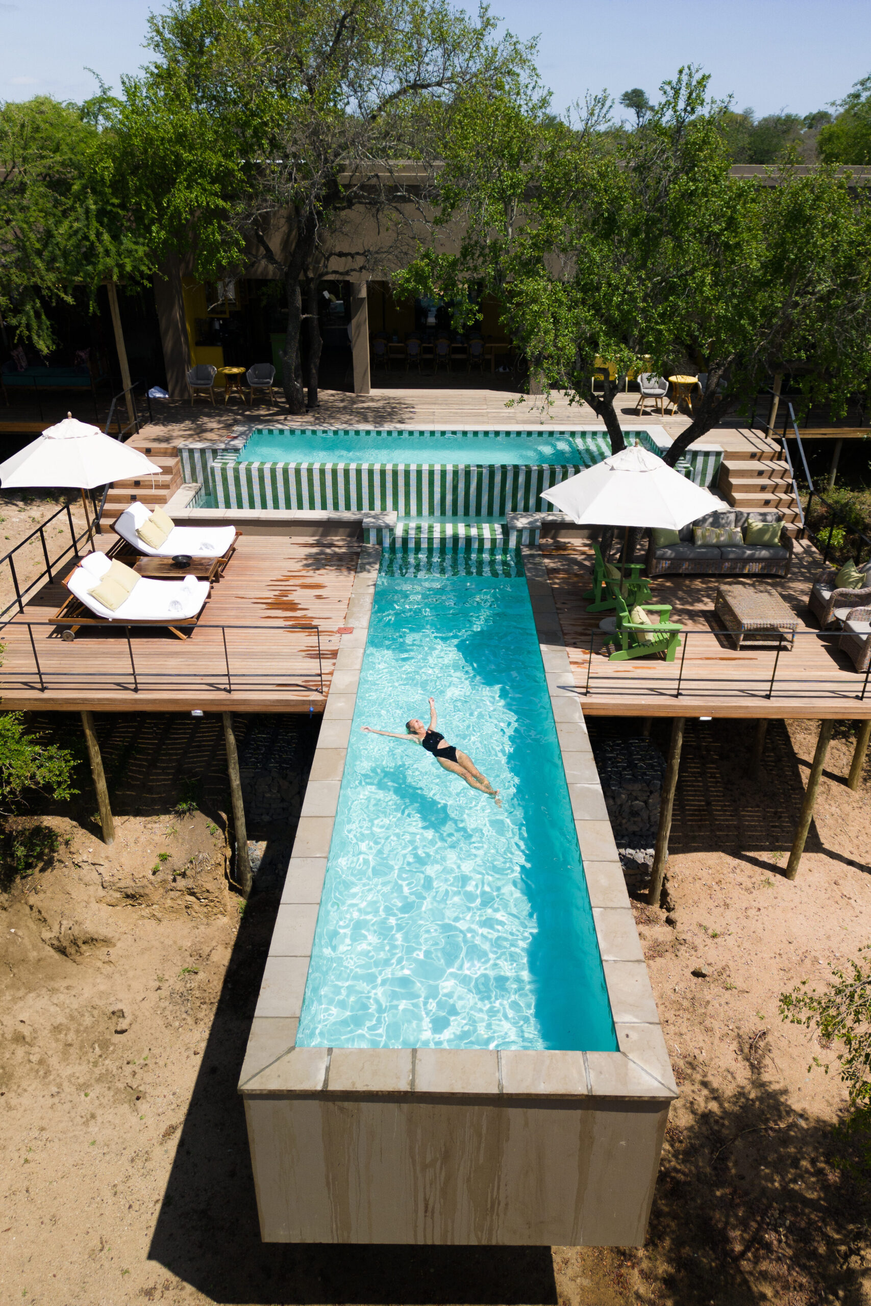 salty luxe floating in the pool at royal malewane africa house