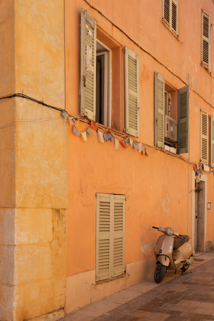 street with orange building in french riviera