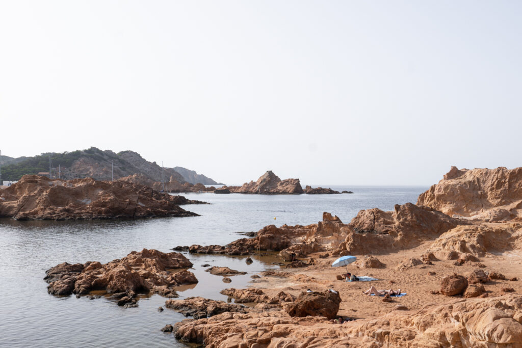 cala pregonda menorca with its rocky beach