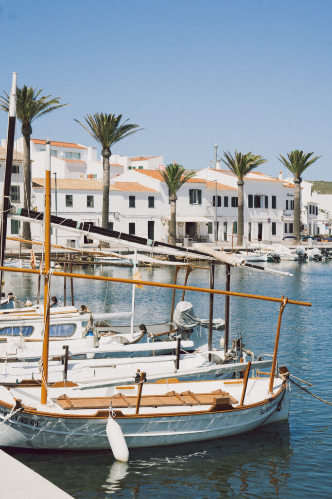 boats in the harbor at fornells menorca