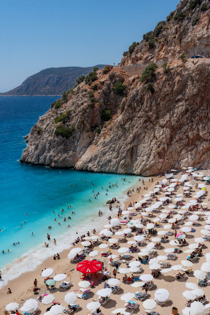 kaputas beach turkey with white umbrellas and blue water