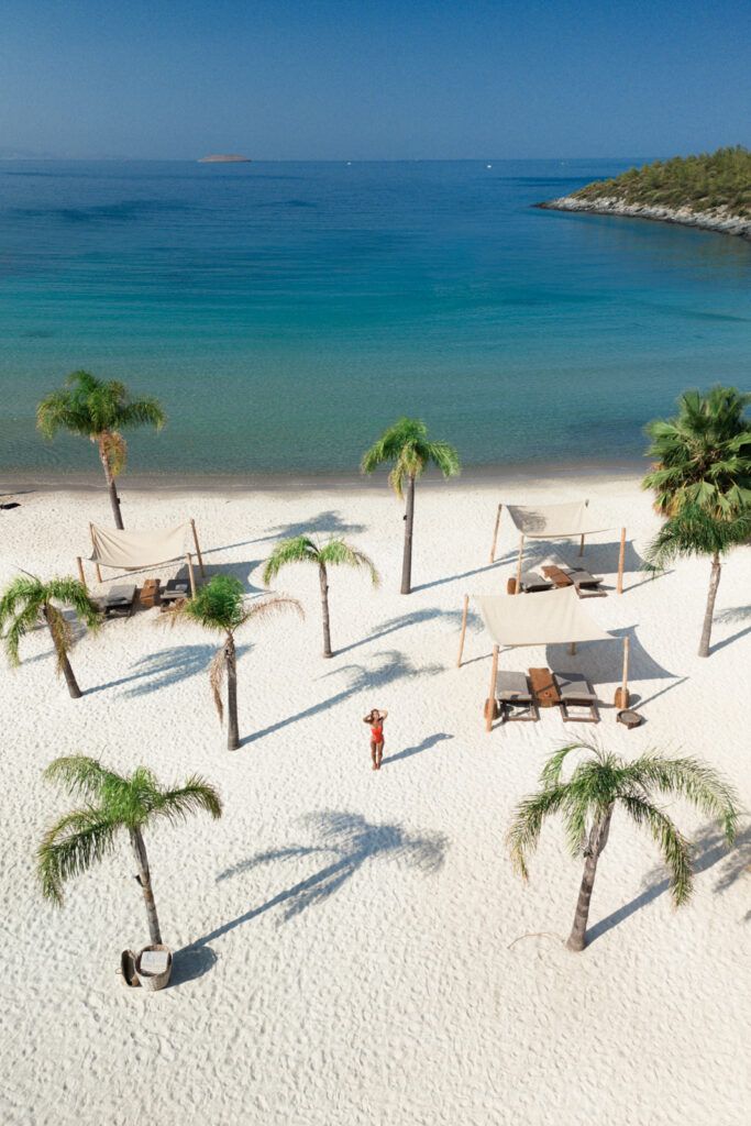 Six Senses Kaplankaya on the turquoise coast turkey with palm trees on a white sand beach and crystal clear water