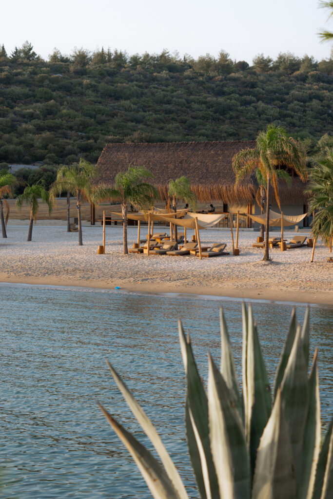 the beach at Six Senses Kaplankaya with loungers 