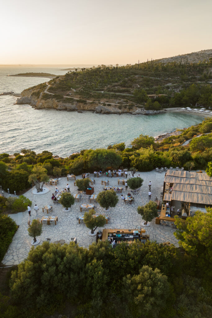 view looking down on a restaurant at Six Senses Kaplankaya at sunset