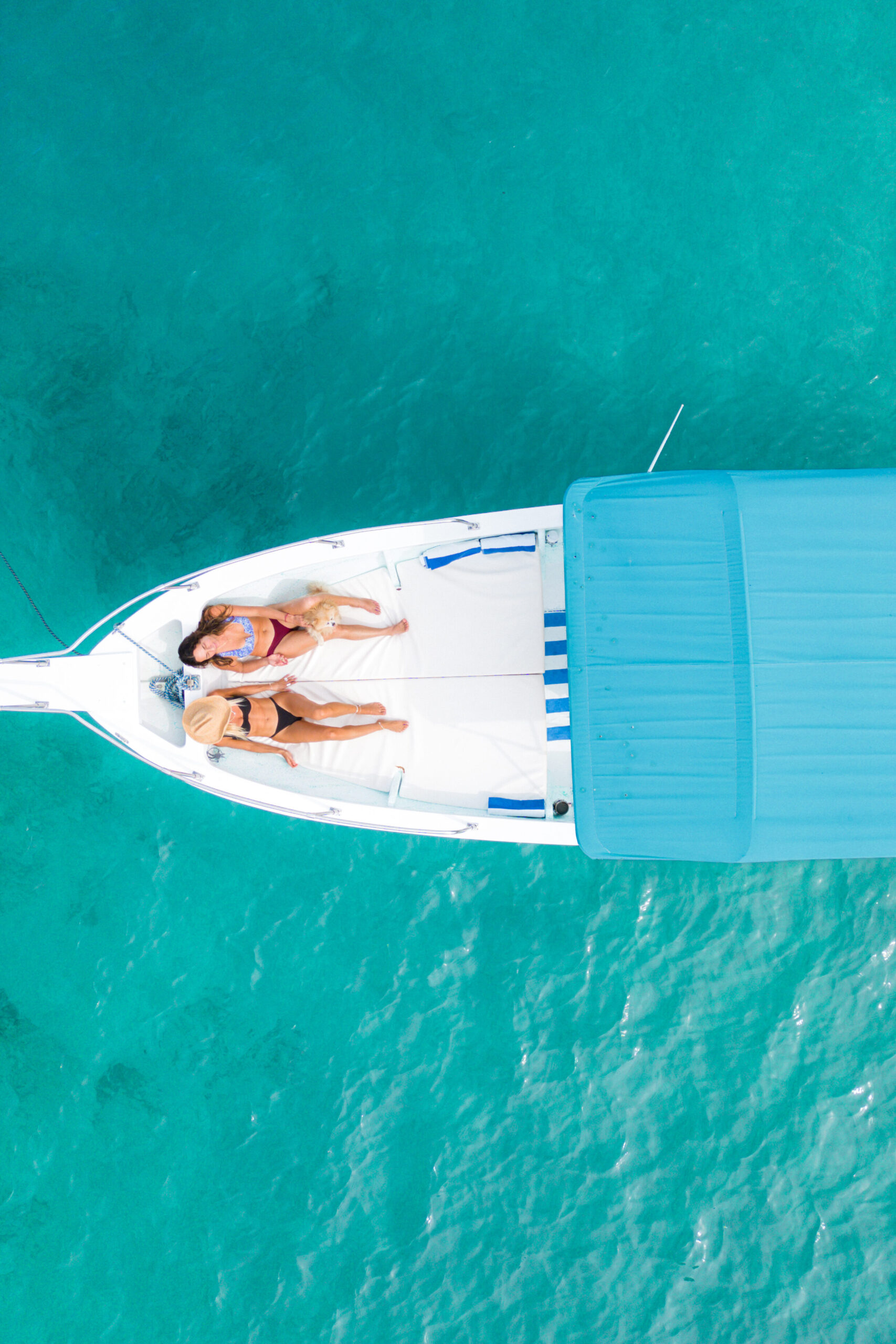 two women on a boat in costalegre mexico with costa careyes