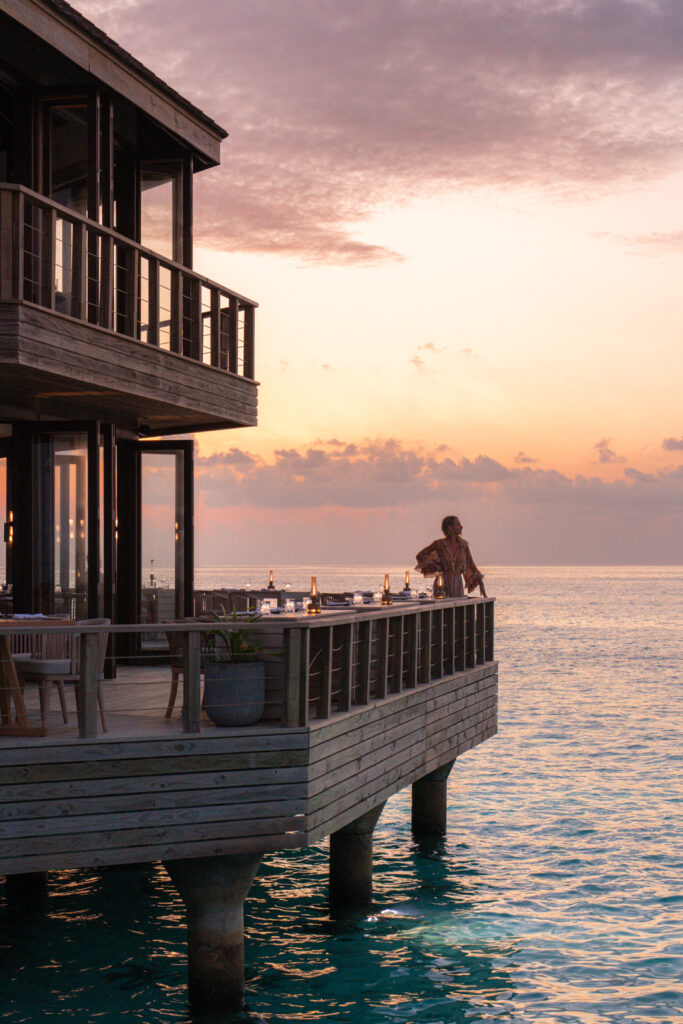 Salty Luxe at sunset at an overwater restaurant at Jawakara Maldives